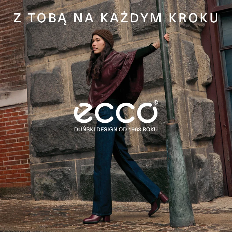 Kobieta w stylowym stroju przy latarni, ECCO.