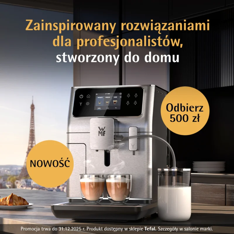 Ekspres do kawy WMF z dwoma filiżankami i widokiem na miasto.