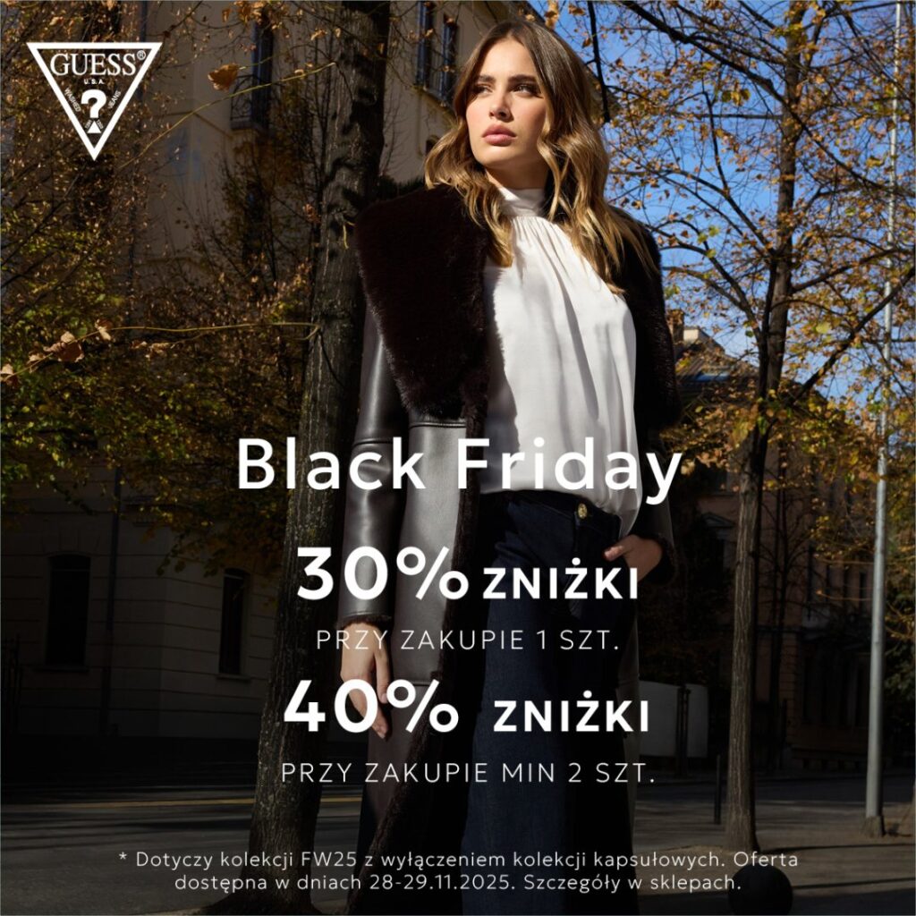 Kobieta w modnym płaszczu na tle jesiennego parku, promocja Black Friday.