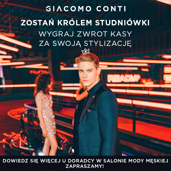 Mężczyzna w eleganckim garniturze na tle neonowych świateł.