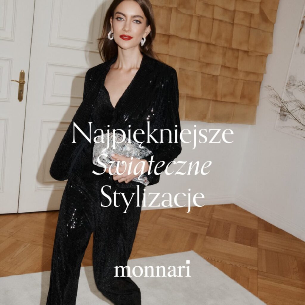Kobieta w eleganckiej, czarnej, błyszczącej stylizacji świątecznej.