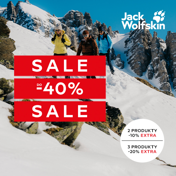 Trzech narciarzy na śnieżnym stoku górskim, promocja do 40% zniżki.