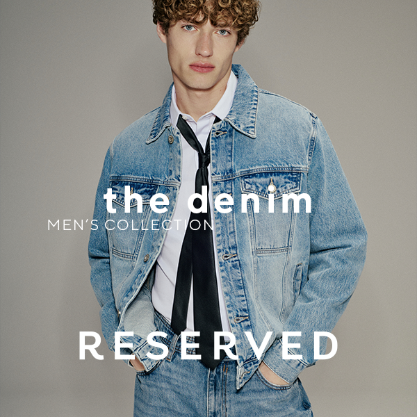 Mężczyzna w dżinsowej kurtce z kolekcji męskiej Reserved.