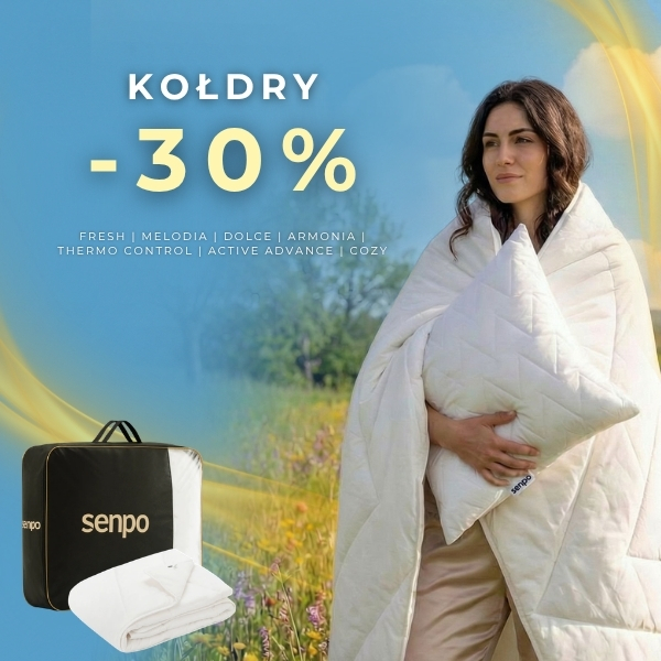 Kobieta w polu trzymająca kołdrę, promocja 30% na kołdry Senpo.